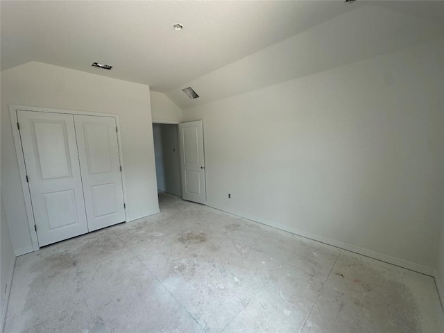 22120 Cross Timber Bnd, Lago Vista, TX 78645 - unfurnished bedroom with vaulted ceiling and a closet