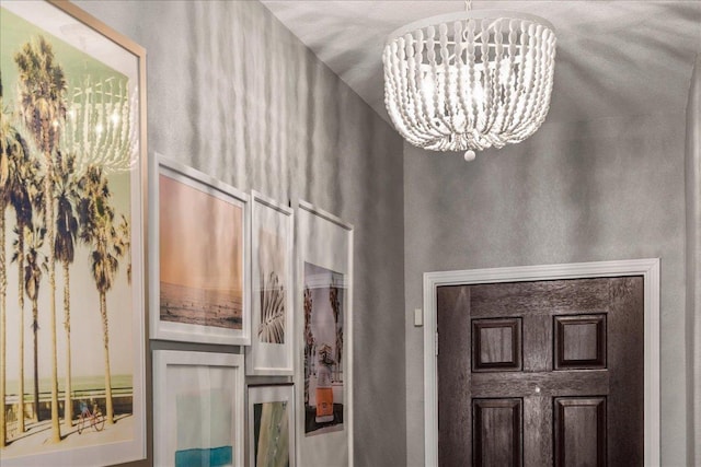 interior space with a chandelier