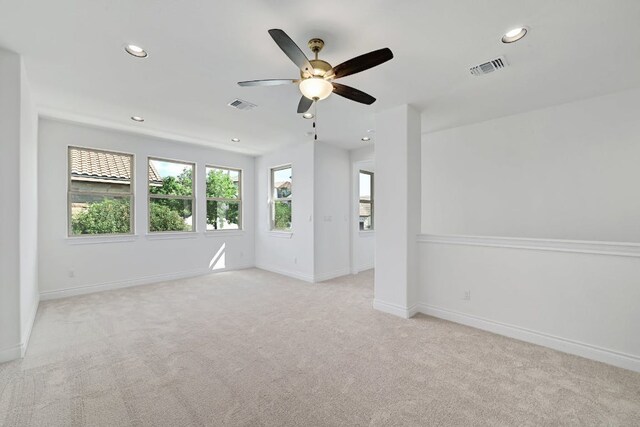 905 Crestone Stream Dr, Austin, TX 78738 - unfurnished room featuring light carpet, healthy amount of natural light, recessed lighting, and ceiling fan