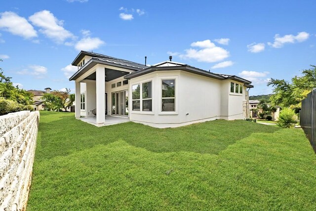 905 Crestone Stream Dr, Austin, TX 78738 - rear view of house with a patio and stucco siding