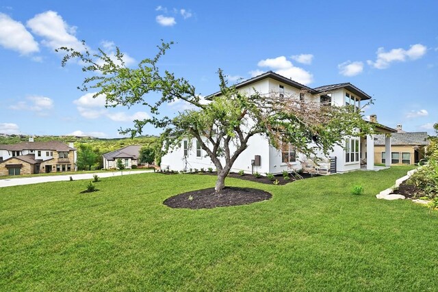 905 Crestone Stream Dr, Austin, TX 78738 - view of side of property featuring a lawn