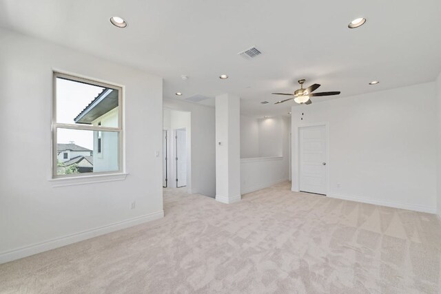 905 Crestone Stream Dr, Austin, TX 78738 - spare room with light carpet, recessed lighting, and ceiling fan