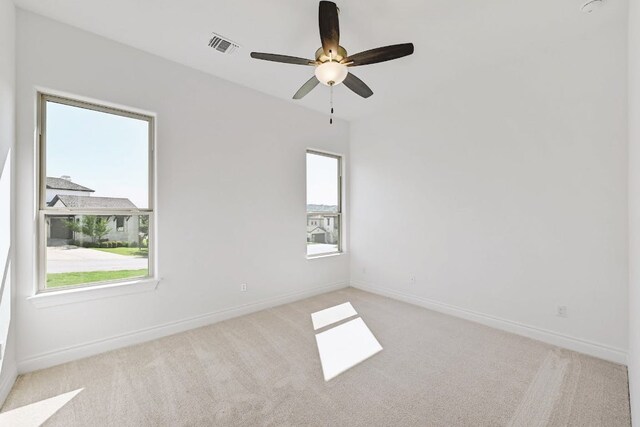 905 Crestone Stream Dr, Austin, TX 78738 - carpeted empty room featuring baseboards and a ceiling fan