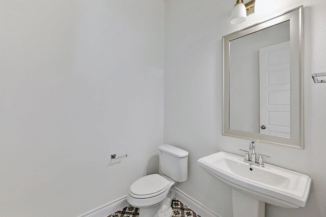 905 Crestone Stream Dr, Austin, TX 78738 - half bathroom with baseboards and toilet