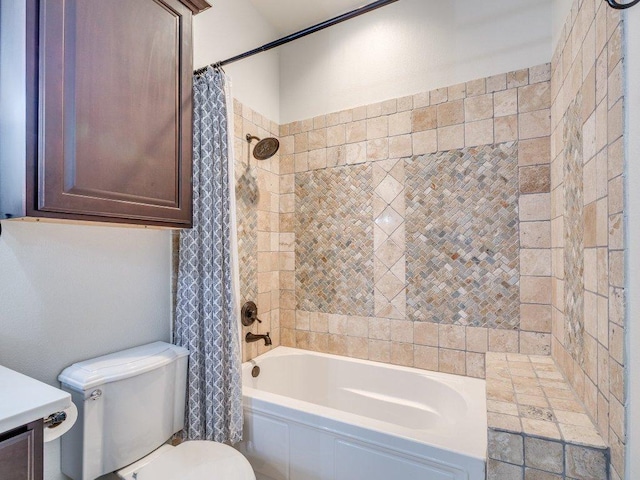 full bathroom with shower / tub combo and toilet