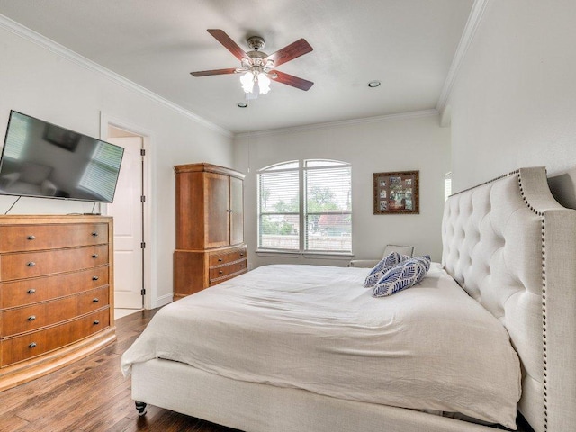 bedroom with recessed lighting, wood finished floors, crown molding, and ceiling fan