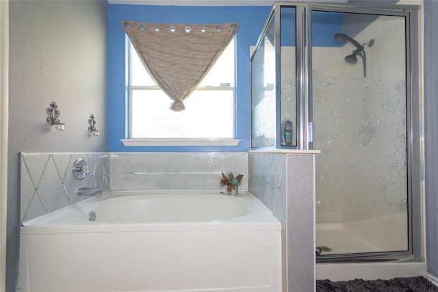 114 Mossy Rock Cv, Hutto, TX 78634 - bathroom with a stall shower and a bath