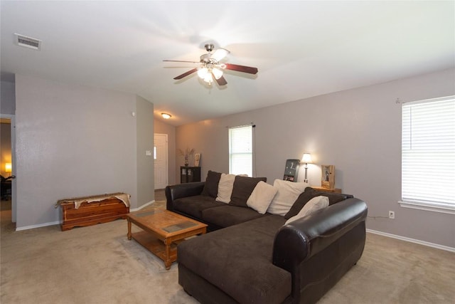 114 Mossy Rock Cv, Hutto, TX 78634 - living area with ceiling fan, light colored carpet, and lofted ceiling