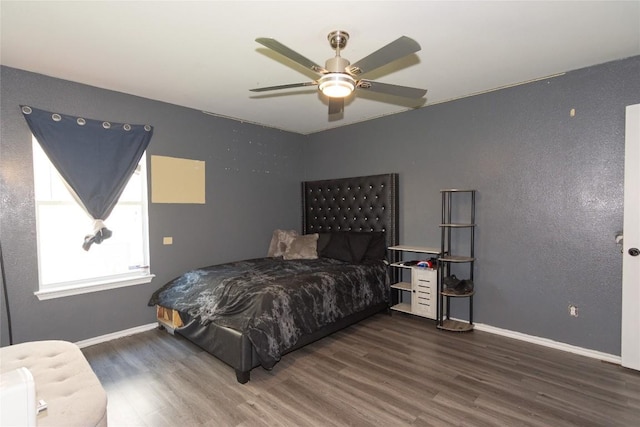 114 Mossy Rock Cv, Hutto, TX 78634 - bedroom with wood finished floors and ceiling fan