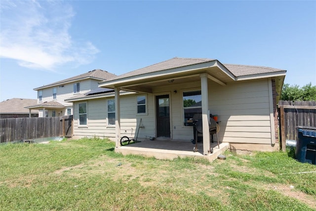 114 Mossy Rock Cv, Hutto, TX 78634 - back of property featuring a patio area and a fenced backyard