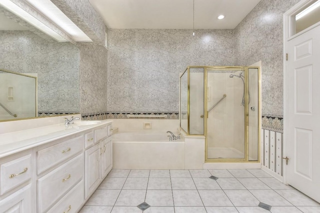 229 Whispering Wind Dr, Georgetown, TX 78633 - full bathroom featuring tile patterned floors, vanity, a shower stall, and a bath