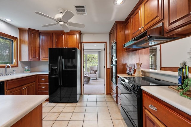4602 Laurel Canyon Dr, Austin, TX 78731 - kitchen featuring black appliances, light countertops, a ceiling fan, light tile patterned floors, and recessed lighting