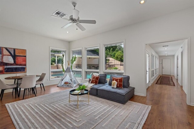 4602 Laurel Canyon Dr, Austin, TX 78731 - living room with wood finished floors, ceiling fan, and recessed lighting