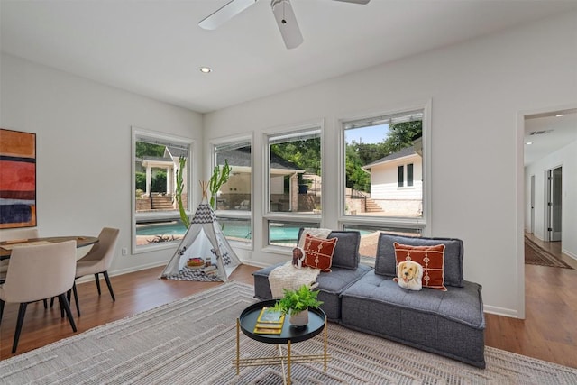 4602 Laurel Canyon Dr, Austin, TX 78731 - living area with wood finished floors, ceiling fan, and recessed lighting