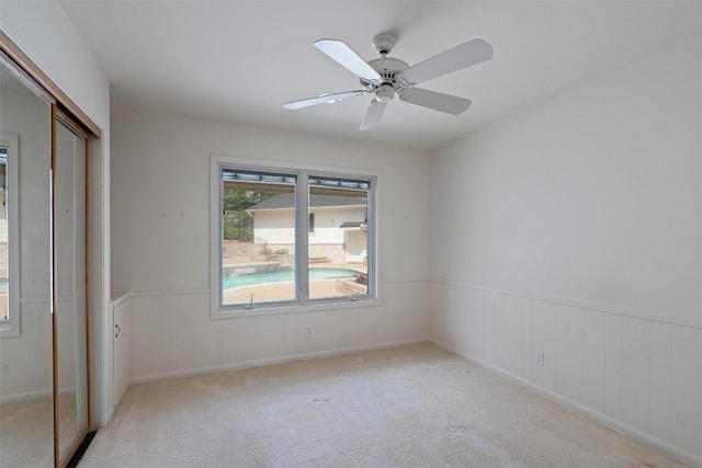 4602 Laurel Canyon Dr, Austin, TX 78731 - unfurnished bedroom with a closet, carpet floors, and a ceiling fan