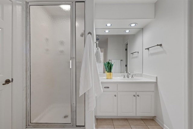 4602 Laurel Canyon Dr, Austin, TX 78731 - bathroom with vanity, tile patterned flooring, a stall shower, and recessed lighting