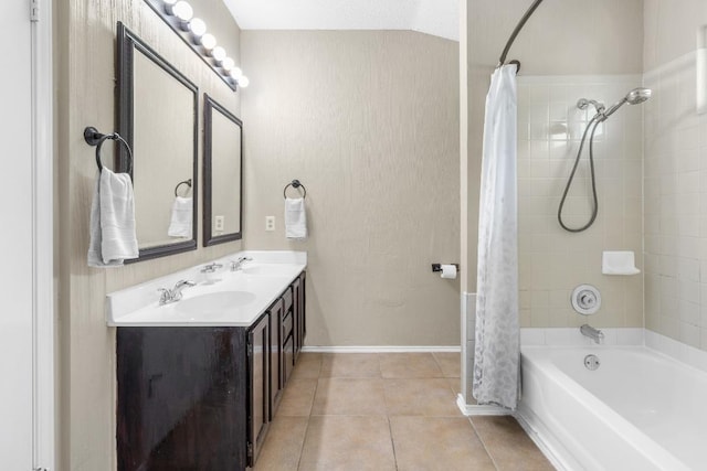 2814 Buckeye Trl, Cedar Park, TX 78613 - bathroom with shower / tub combo with curtain, tile patterned flooring, double vanity, and baseboards