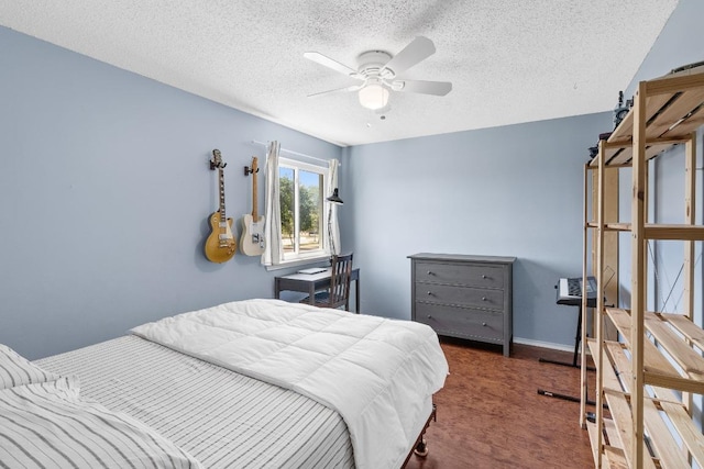 2814 Buckeye Trl, Cedar Park, TX 78613 - carpeted bedroom featuring a textured ceiling and a ceiling fan