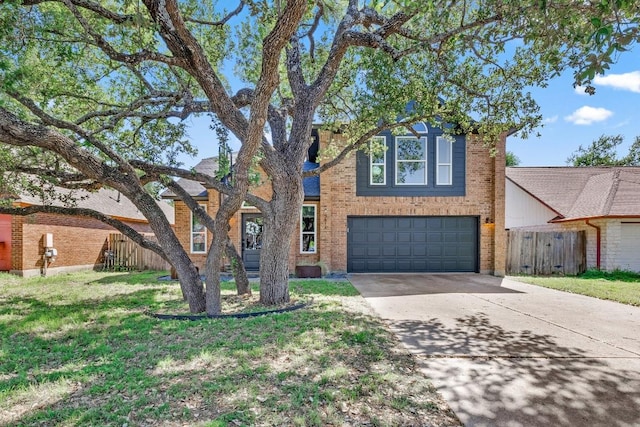 2814 Buckeye Trl, Cedar Park, TX 78613 - traditional home with driveway, an attached garage, and brick siding