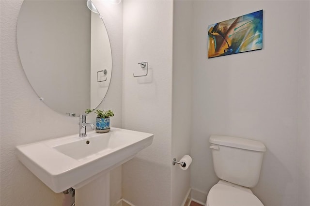 2050 Lohmans Spur Rd Unit 1302, Lakeway, TX 78734 - half bath featuring toilet and a sink