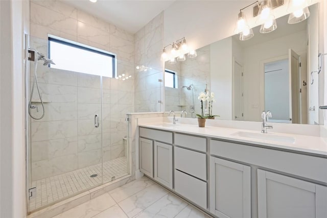 2050 Lohmans Spur Rd Unit 1302, Lakeway, TX 78734 - bathroom with marble finish flooring, a stall shower, and double vanity