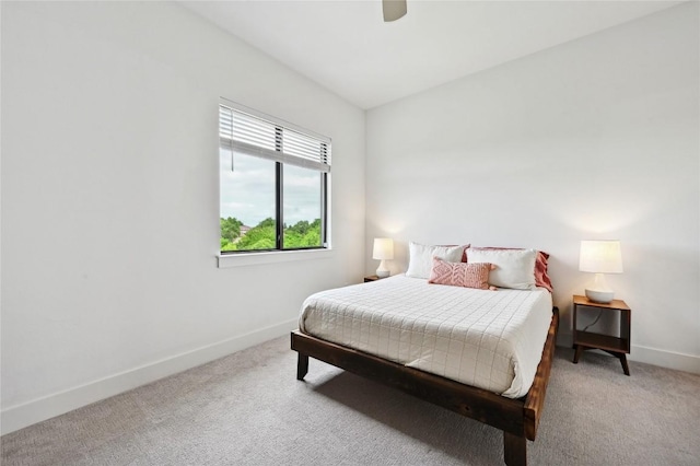 2050 Lohmans Spur Rd Unit 1302, Lakeway, TX 78734 - bedroom with light colored carpet, baseboards, and a ceiling fan