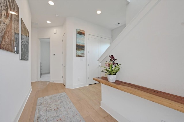 2050 Lohmans Spur Rd Unit 1302, Lakeway, TX 78734 - hallway featuring light wood-style floors, recessed lighting, and baseboards