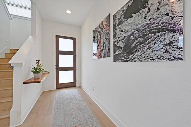2050 Lohmans Spur Rd Unit 1302, Lakeway, TX 78734 - entryway featuring plenty of natural light, wood finished floors, stairs, recessed lighting, and baseboards