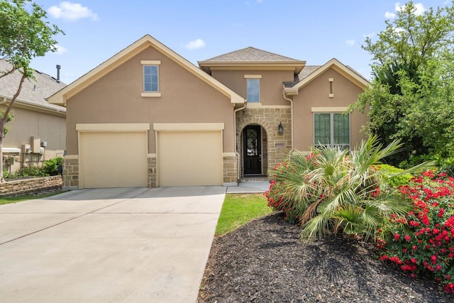 3905 Veneto Cir, Leander, TX 78641 - traditional home featuring stucco siding, stone siding, and driveway