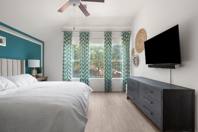 3905 Veneto Cir, Leander, TX 78641 - bedroom featuring lofted ceiling, light wood-style floors, and ceiling fan