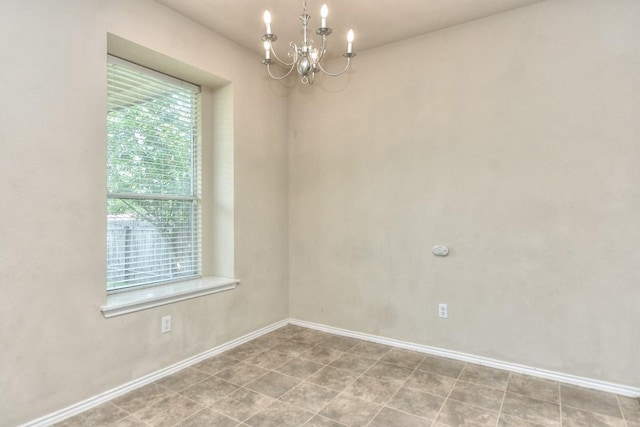 2625 Summerwalk Pl, Round Rock, TX 78665 - empty room featuring a chandelier and baseboards