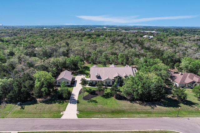 aerial view featuring a view of trees