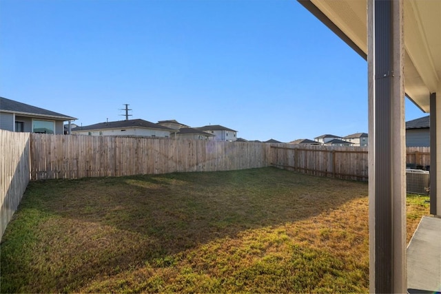 view of yard featuring a fenced backyard