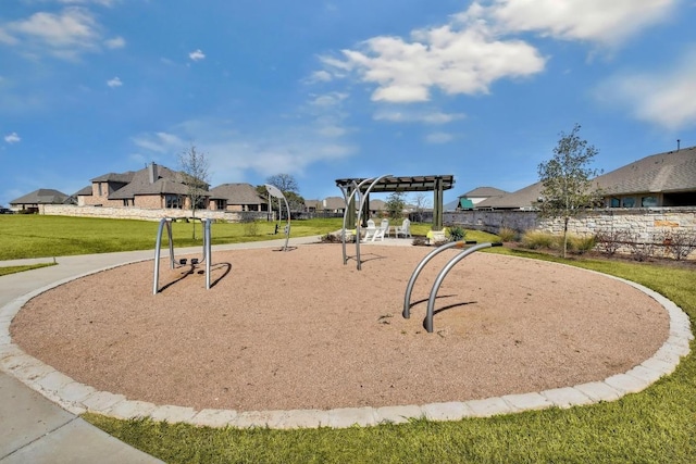 view of property's community featuring a pergola, a yard, and a residential view