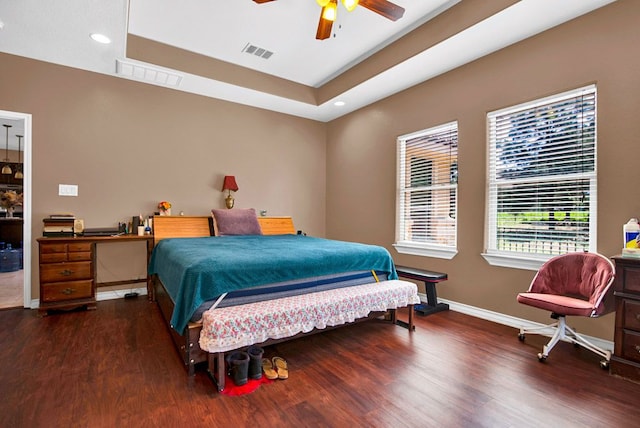 316 County Rd, Bastrop, TX 78602 - bedroom with wood finished floors, a raised ceiling, recessed lighting, and a ceiling fan