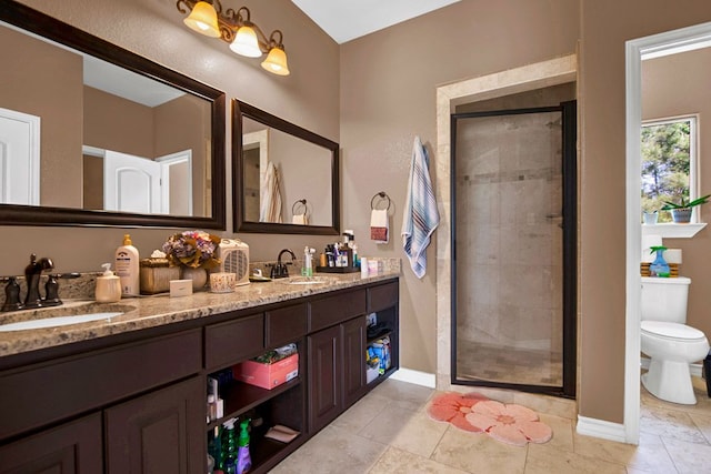 316 County Rd, Bastrop, TX 78602 - bathroom with double vanity, a shower stall, and tile patterned flooring
