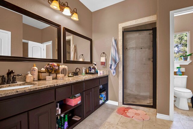 316 County Rd, Bastrop, TX 78602 - bathroom with double vanity, a stall shower, and tile patterned flooring
