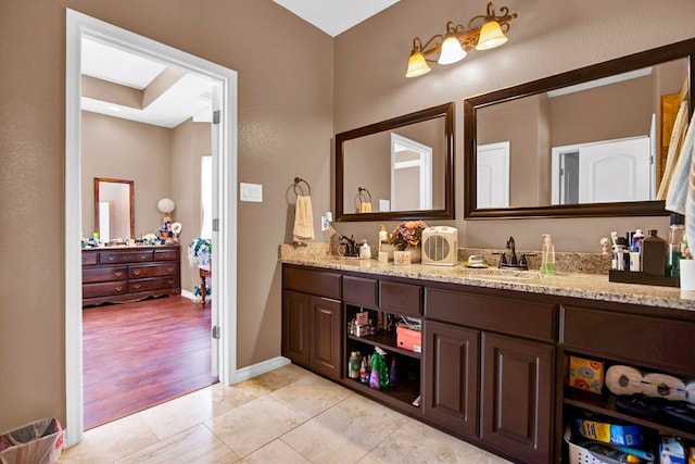 316 County Rd, Bastrop, TX 78602 - full bath featuring double vanity and tile patterned flooring