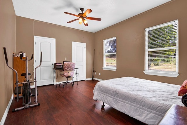 316 County Rd, Bastrop, TX 78602 - bedroom featuring wood finished floors and a ceiling fan