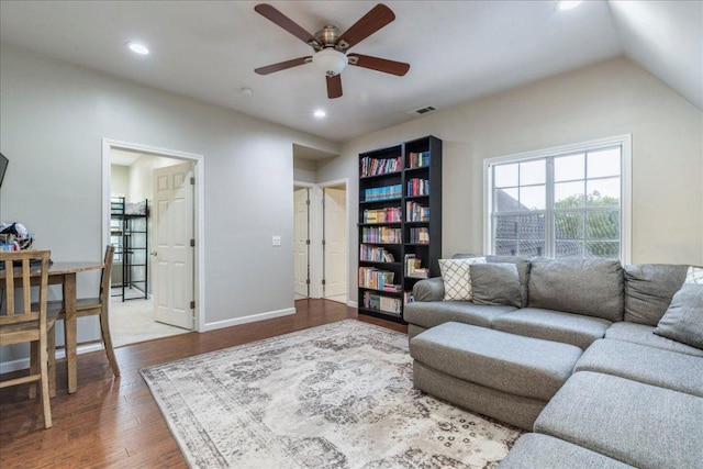 living area featuring visible vents, a ceiling fan, wood finished floors, and recessed lighting
