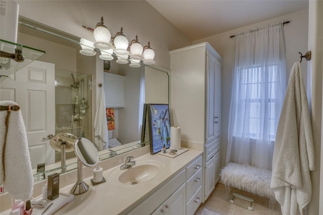 full bathroom featuring tile patterned flooring, walk in shower, vanity, and a chandelier