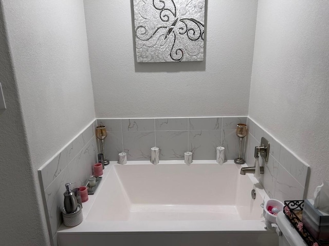 bathroom with a bath