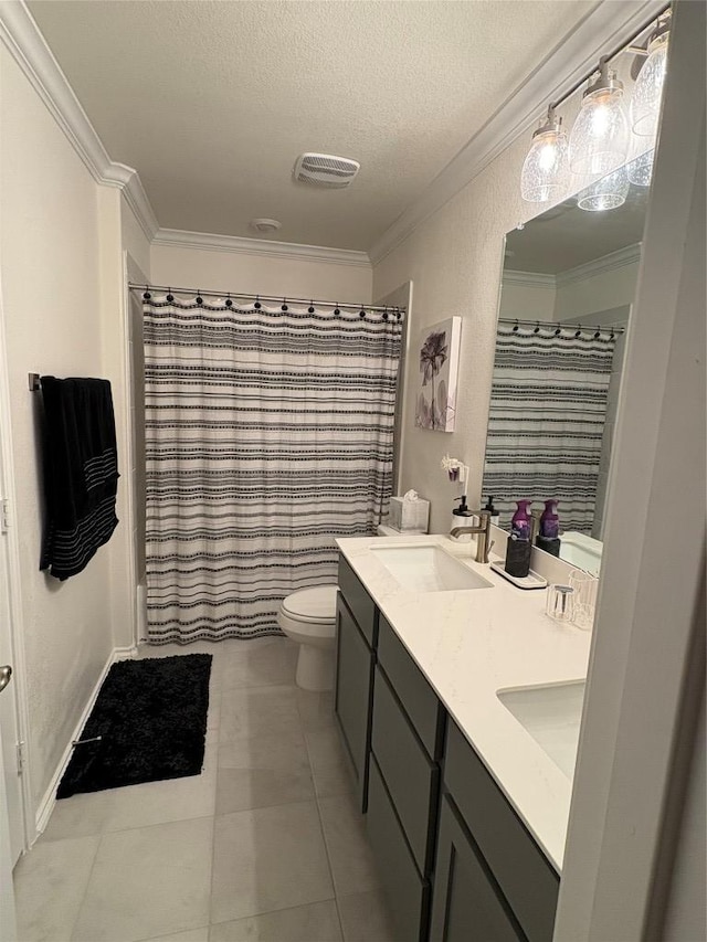 bathroom featuring a sink, a textured ceiling, toilet, visible vents, and crown molding