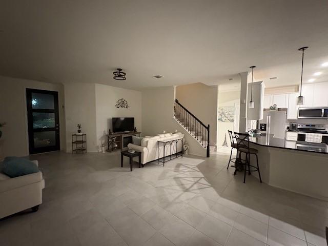 living area with stairway