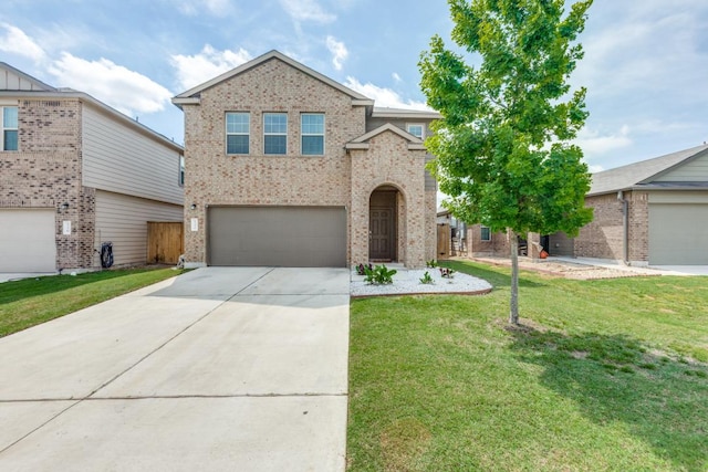 traditional home featuring brick siding, a front yard, driveway, and a garage