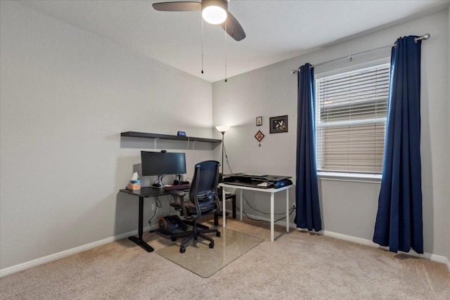 609 Bluffview Dr, Bastrop, TX 78602 - home office featuring carpet floors, baseboards, and a ceiling fan