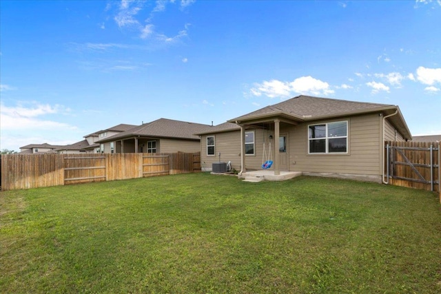 609 Bluffview Dr, Bastrop, TX 78602 - back of property featuring central air condition unit and a patio area