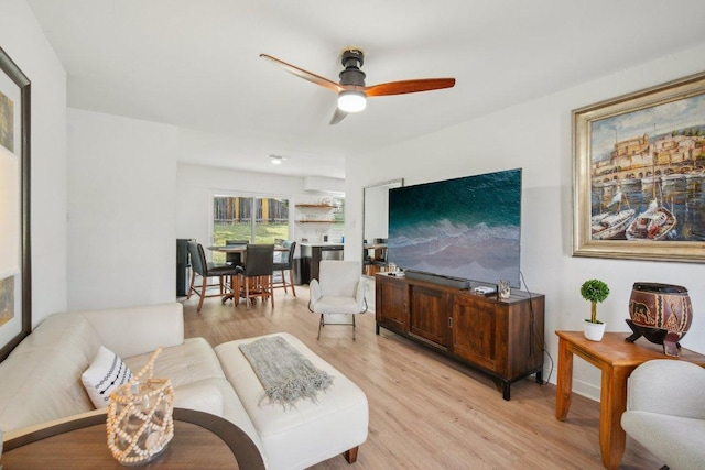 6914 Pondsdale Ln, Austin, TX 78724 - living room with light wood-style flooring and a ceiling fan