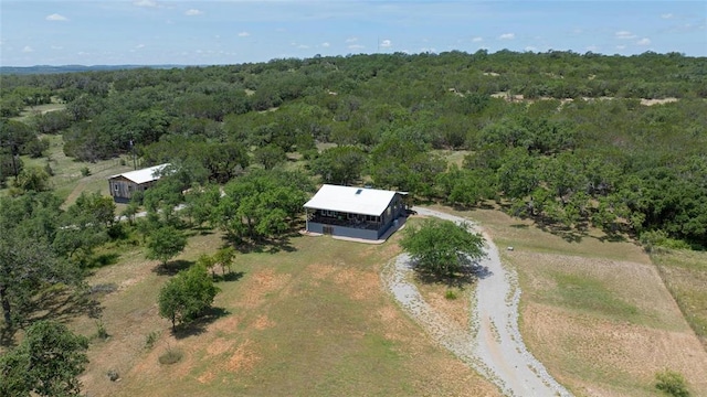 aerial view featuring a forest view