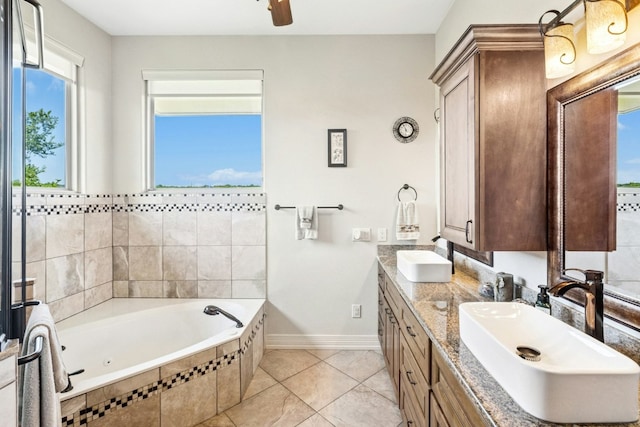 1204 Ogden Dr, Austin, TX 78733 - bathroom with a garden tub, double vanity, and tile patterned floors